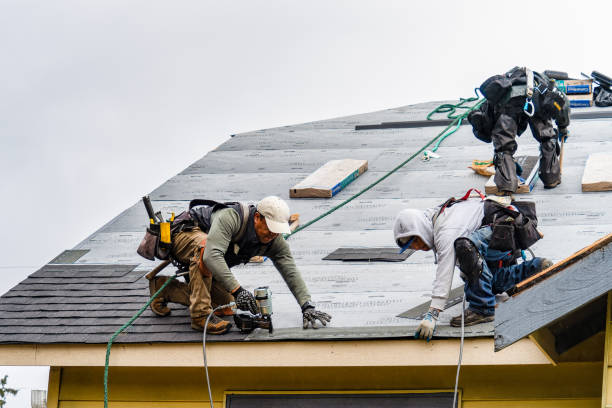 Professional Storm Damage Roof Repair technician working in Mentcle, PA